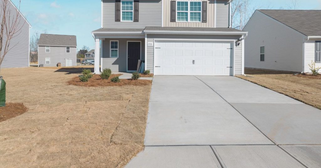 concrete driveway installed at a residential property in Houston TX
